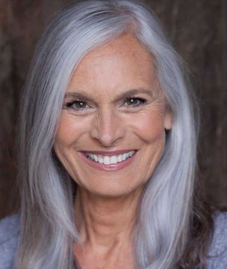 Silver Highlights Smooth And Wavy Hairstyle For Women Over 50