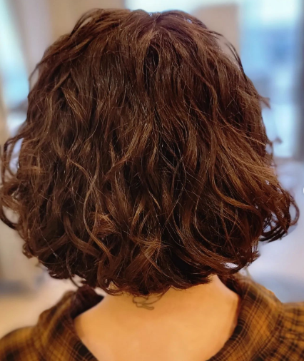Smooth Short Curly Hair Style For Women