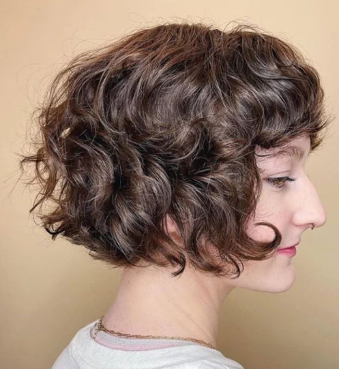 Spindly Short Hairstyle For Thick Wavy Hair