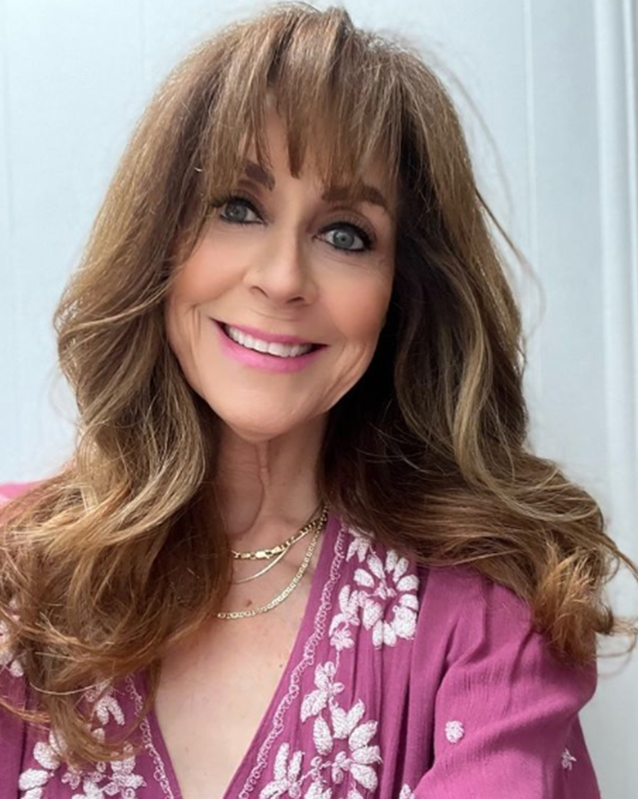 Wispy Bangs With Wavy Hairstyle For Women Over 50