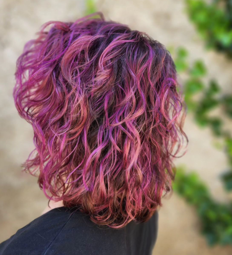 Curly Bob With Purple Highlights In Brown Hair