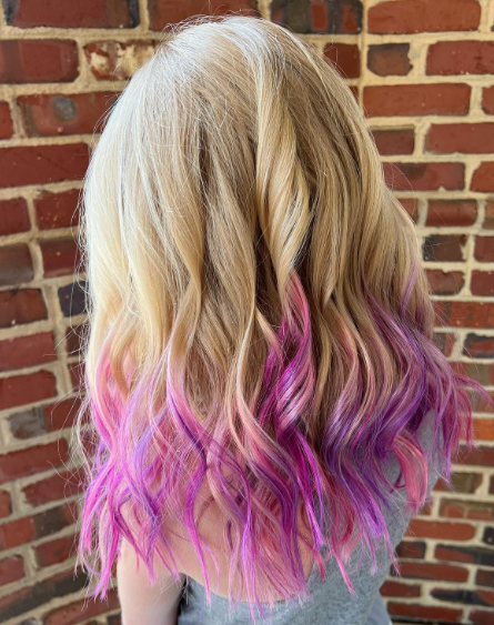 Curly Light Blonde With Purple Highlights In Brown Hair