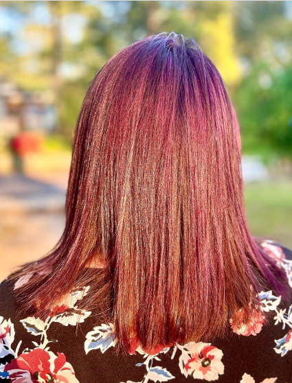 Glossy Purple Highlights In Brown Hair
